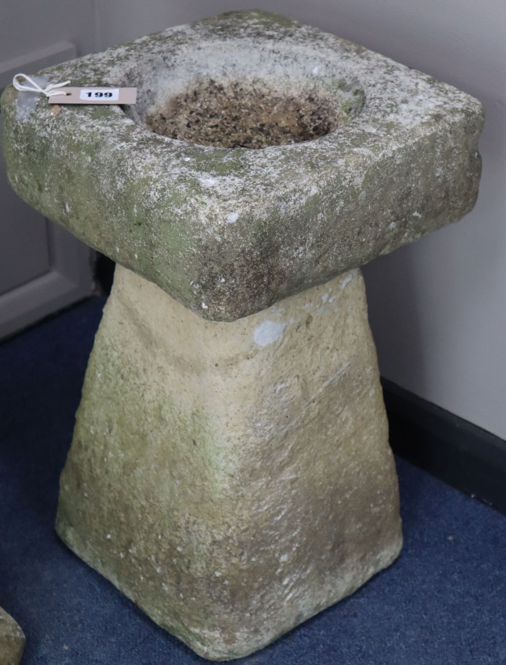 A reconstituted stone garden bird bath, H.50cm